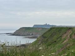 Looking back across Scalby Ness Rocks to the castle in the distance